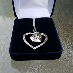 Montana silversmiths. Silver love pendant.